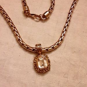Gold snake chain with crystal pendant